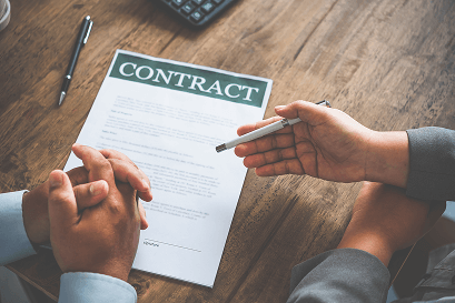 afbeelding van een contract die getekend worden